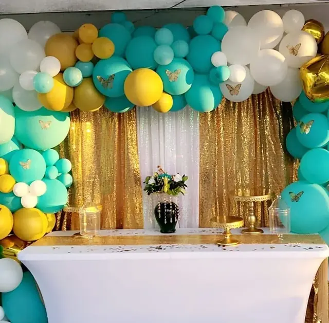 Turquoise, gold and white GlamWorX balloon and dessert display